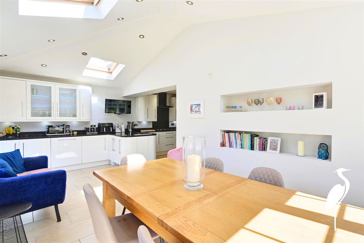 Open Kitchen/Dining and Family Area - Picture 9 of 31