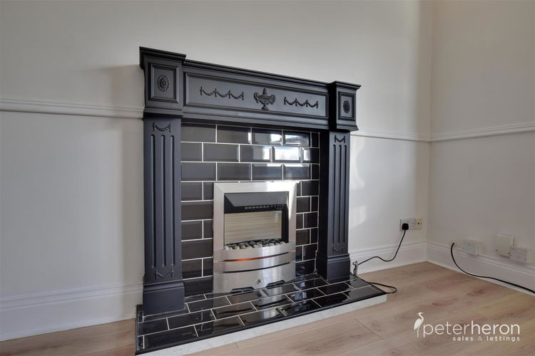 Living Room - Picture 4 of 12